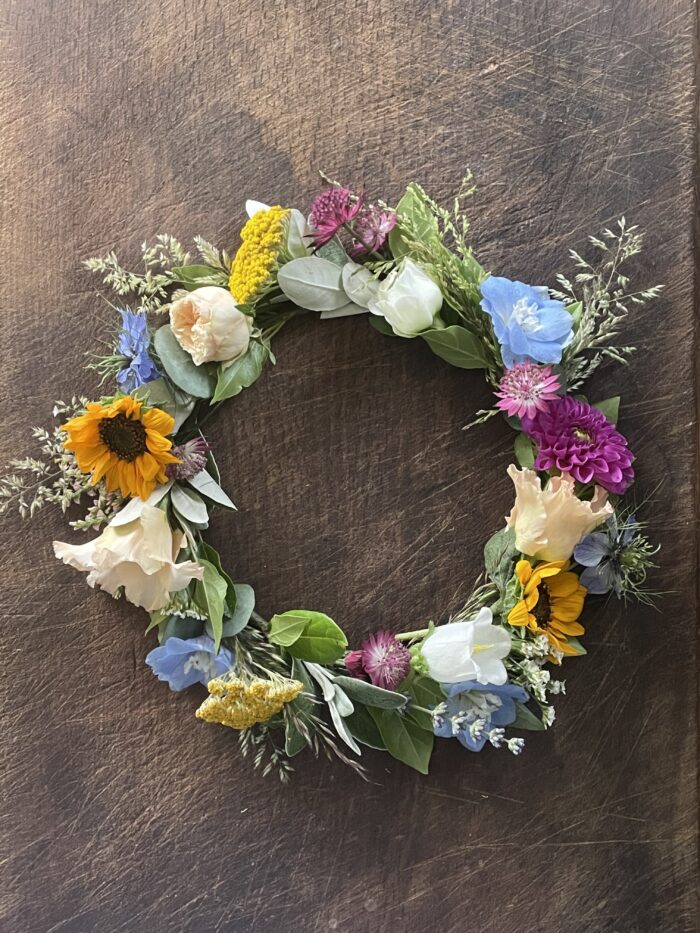 a colourful meadowy flower crown
